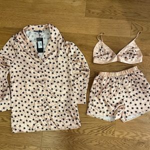 Brand new silk star PJ set. Champagne/pinkish and black.